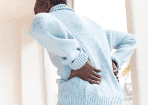 person suffering from back pain